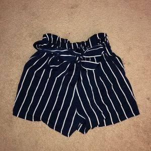 blue shorts w white stripes